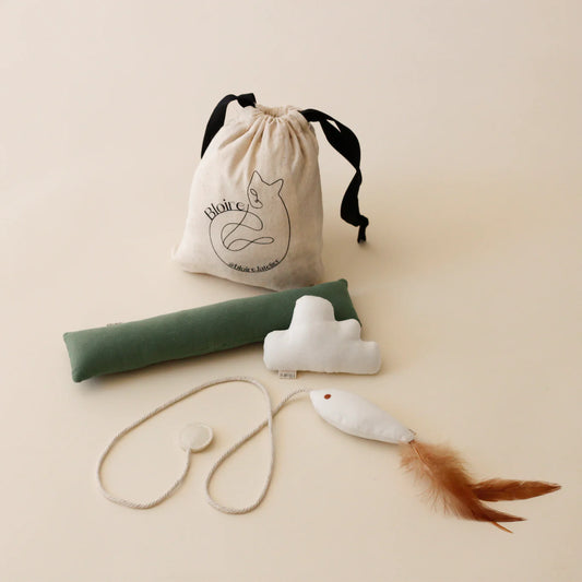 Bloire's Indoor Fishing Toy Bundle featuring three handcrafted catnip toys - a golden fish with natural feathers, an essential interactive wand, and a puffy cloud - thoughtfully designed with premium cotton materials for discerning feline companions and includes catnip.