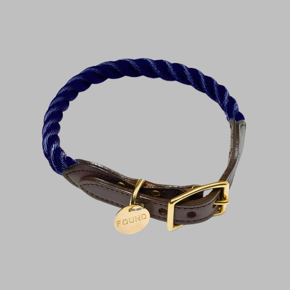 Handcrafted Navy Rope Collar featuring marine-grade nautical rope with solid brass lockable carabiners and individually-numbered tag. This durable, hand-spliced leash combines maritime strength with compassionate purpose, showcasing Found My Animal's commitment to rescue awareness while providing security for adventures with your furry companion