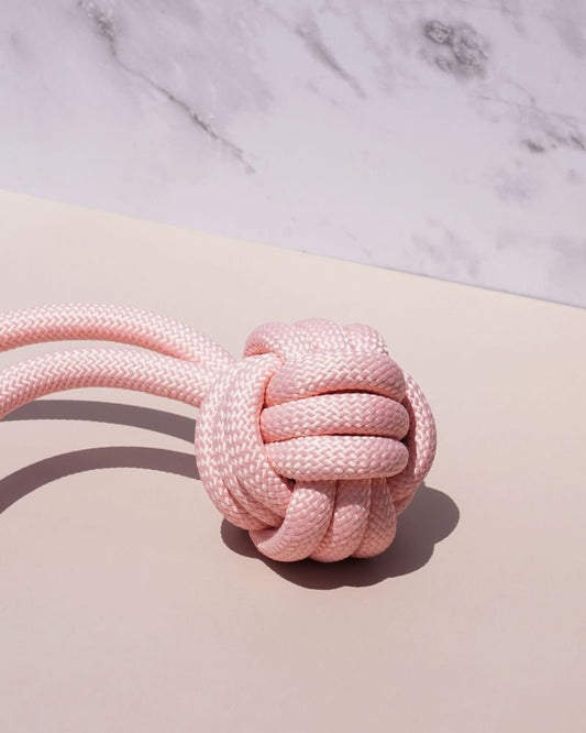 Premium helix-shaped dog rope toy in mint from Athena's Paw featuring powerful durability, dental health benefits and active play for canine companions